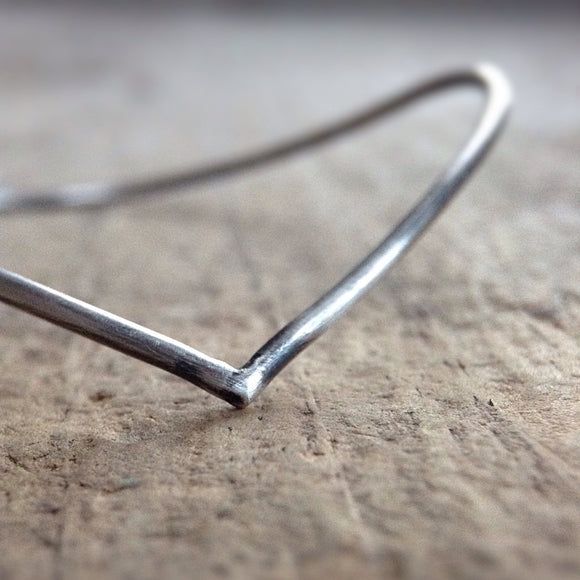 Antique Silver Chevron Bohemian Bangle close up on table